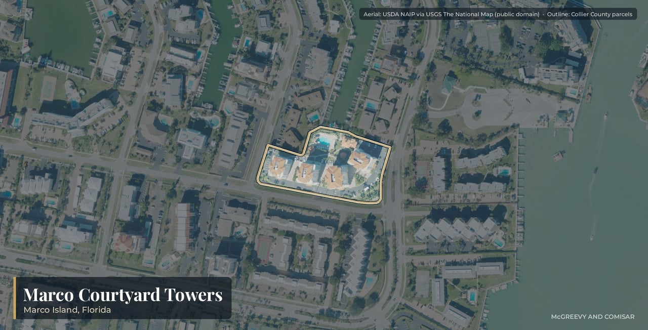 Aerial view of Marco Courtyard Towers on Marco Island, Florida, the four canal-side mid-rise buildings at 1111 to 1141 Swallow Avenue at the south end of the island