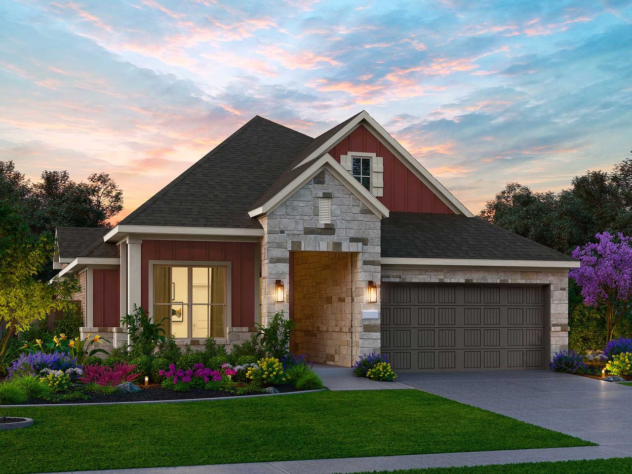 House with red siding, a stone facade, and an attached garage at sunset.