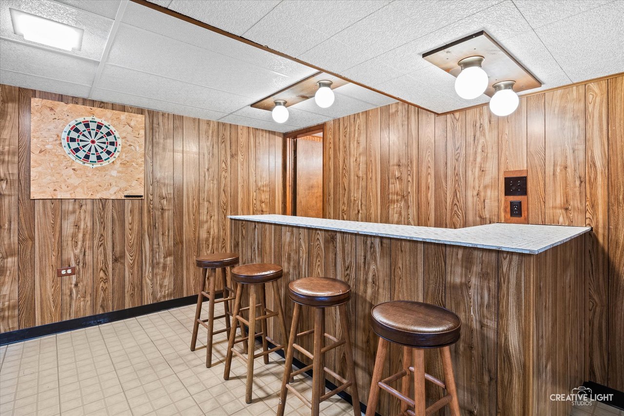 Basement recreation room and dry bar at 304 Crestwood Drive, Roselle, IL