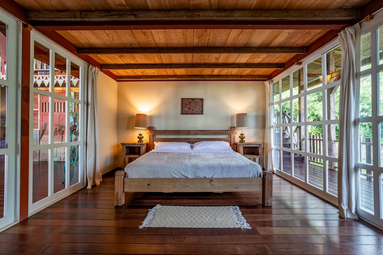 A Handcrafted Residence Immersed in Nature Above the Canopy Ocean View Architectural Home