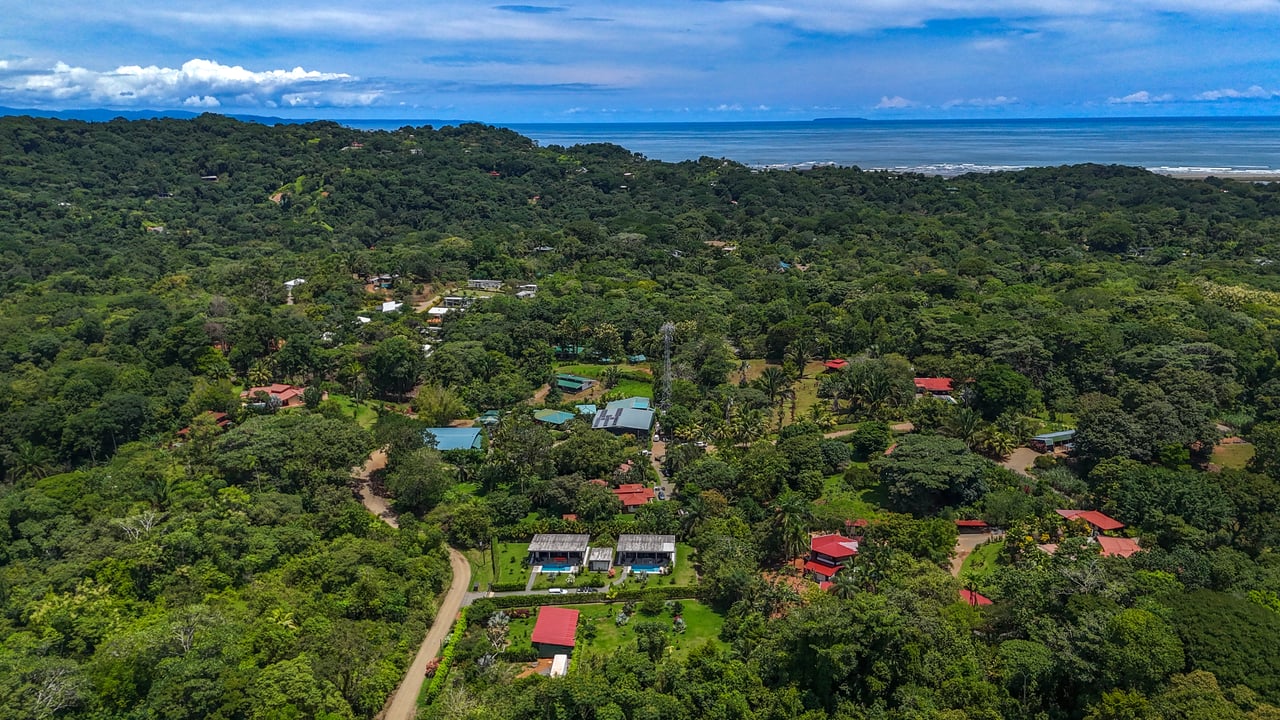 Twin Homes for Sale in Ojochal with Pools & Rental Potential