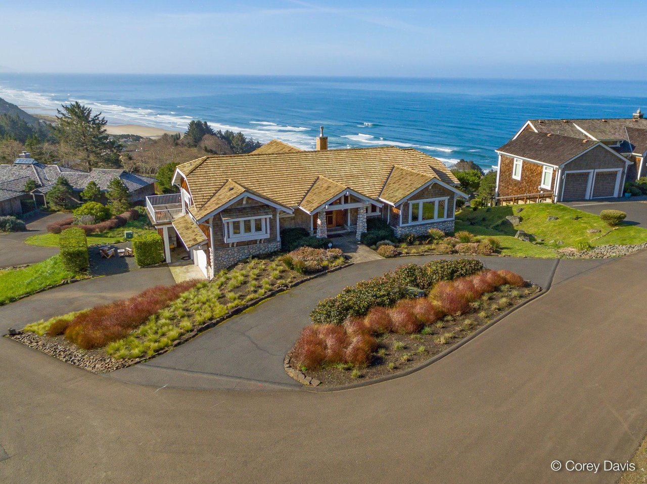 Sold Neahkahnie Meadow home at 8780 Mariners Trail represented by Meadow Davis of Home + Sea Realty with ocean bay coastline and mountain views