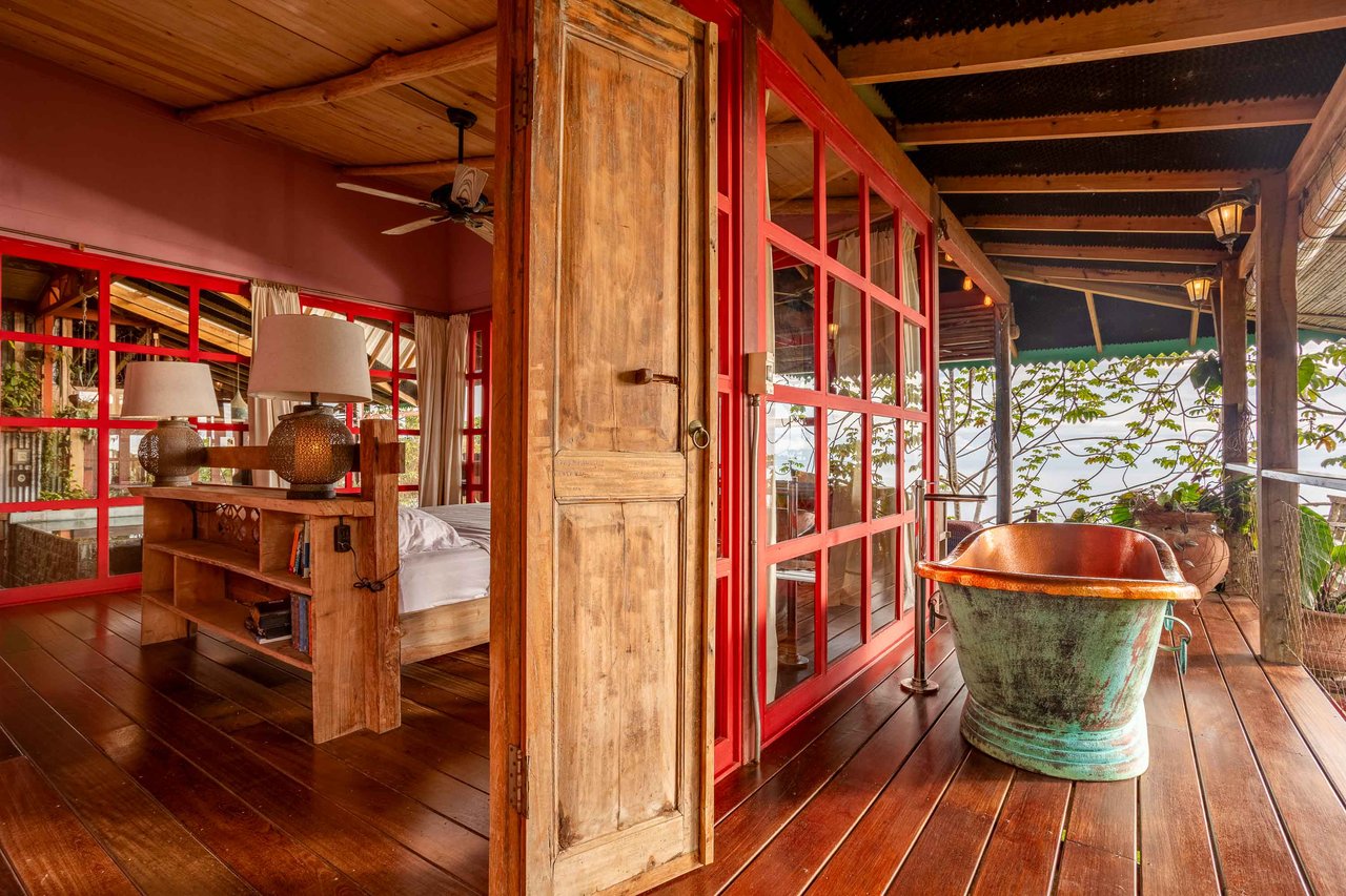 A Handcrafted Residence Immersed in Nature Above the Canopy Ocean View Architectural Home