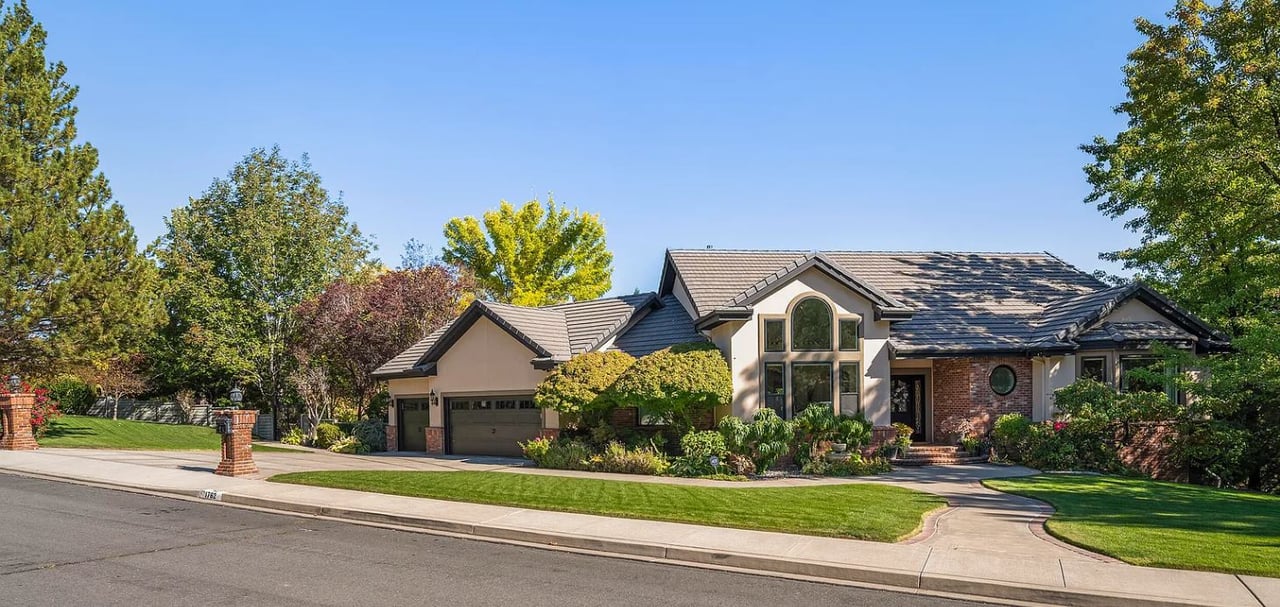 Southwest Reno street with mature landscaping and custom homes