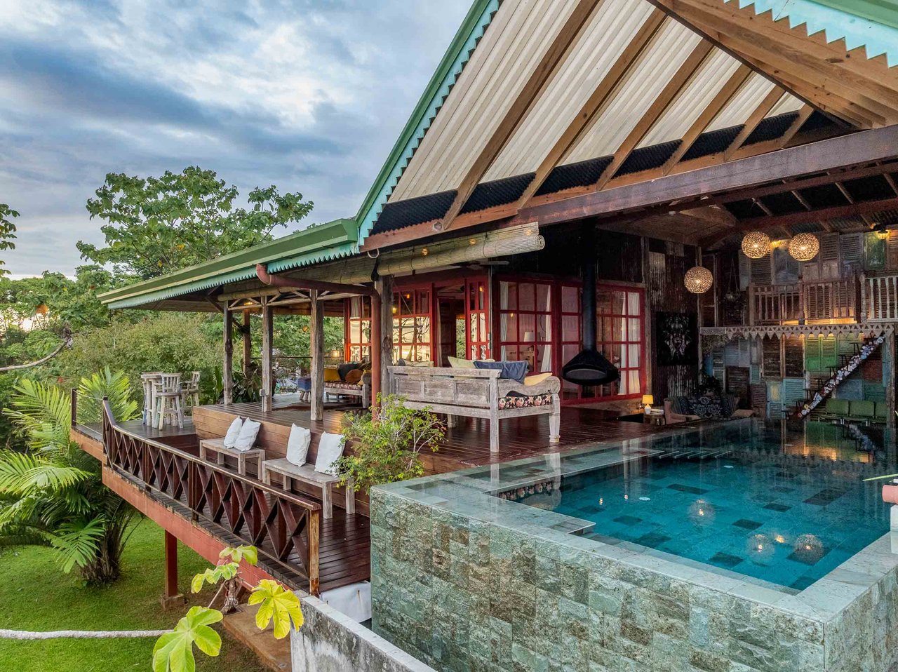 A Handcrafted Residence Immersed in Nature Above the Canopy Ocean View Architectural Home