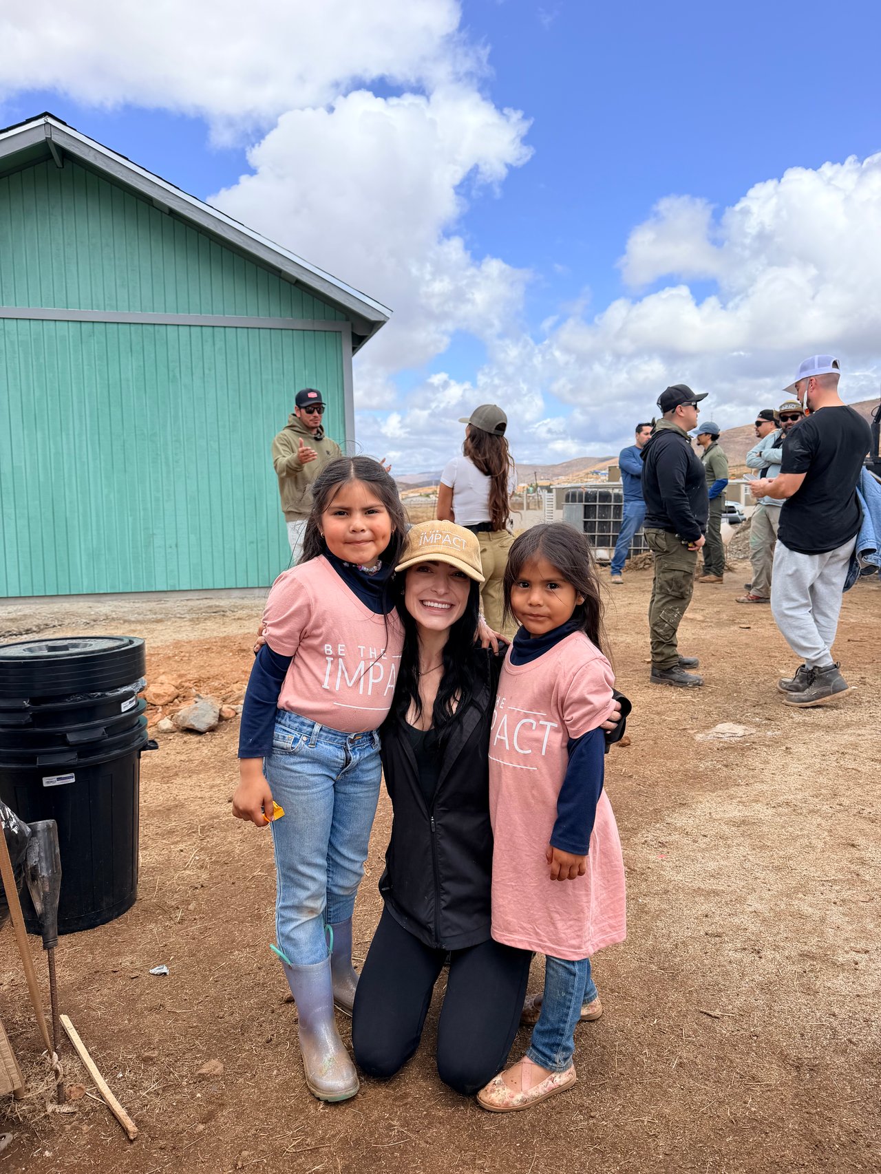 Jade with the two daughters, Genesis and Magda, during the last day of finishing touches on their home. 