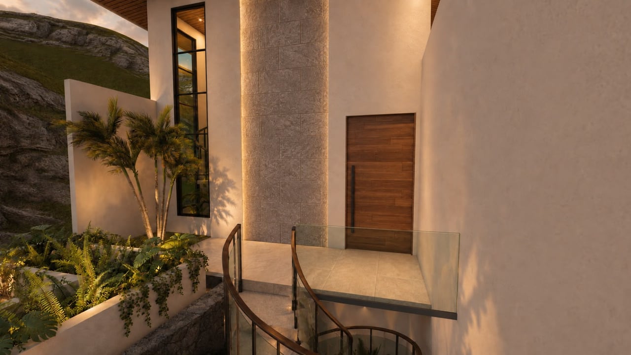 Modern home entrance with a stone accent wall, wood door, glass railings, and tropical landscaping.