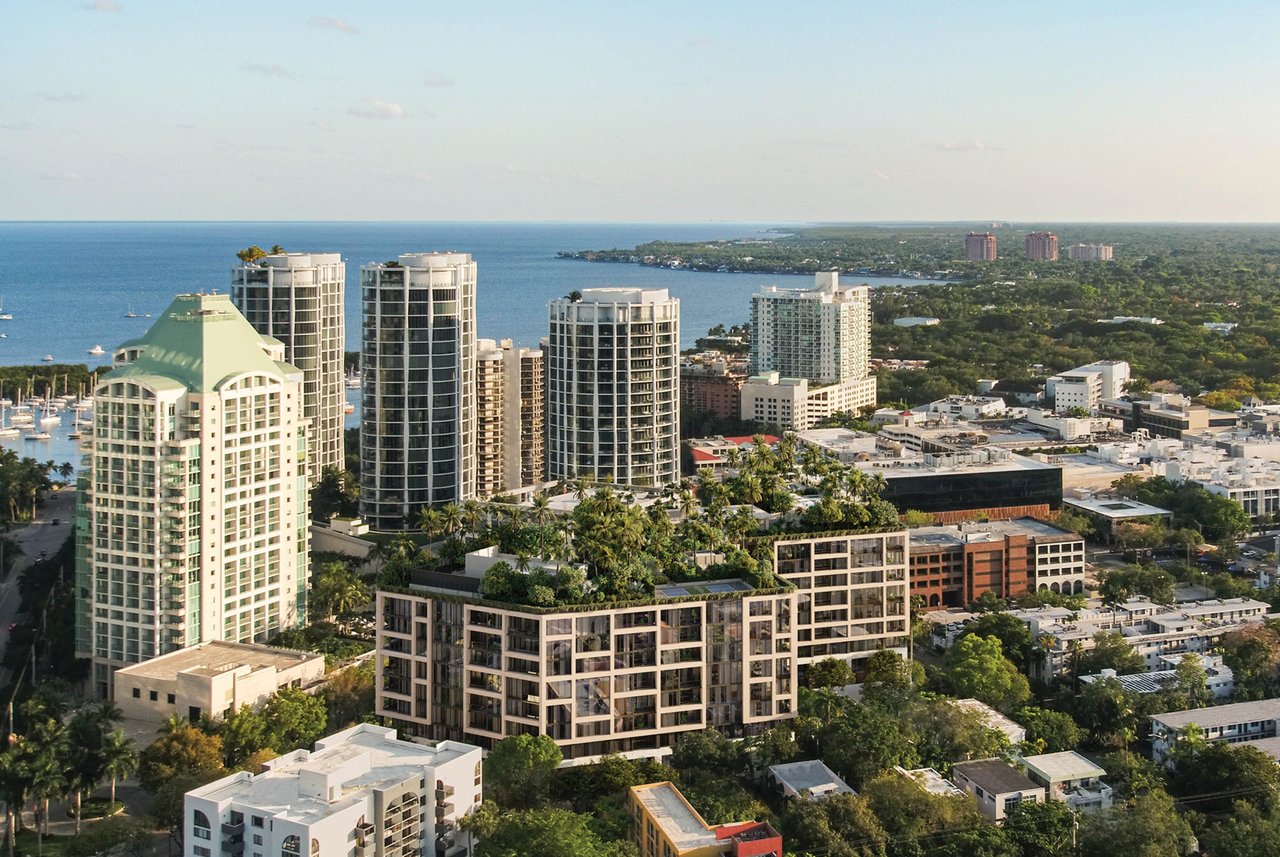 Aerial view of The Well in Coconut Grove, with a landscaped rooftop beside Biscayne Bay.