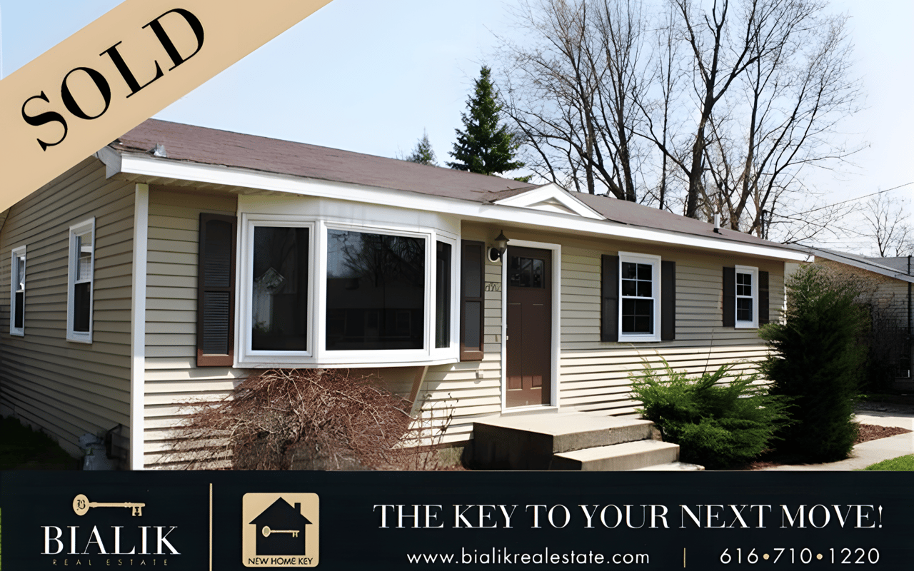 Sold announcement featuring a single-story home, Bialik Real Estate branding, and “The key to your next move!”