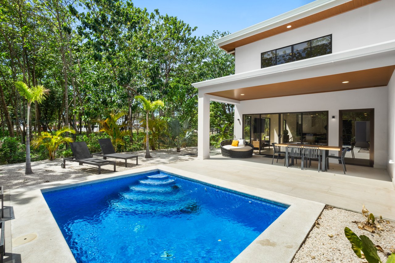 Flamingo Estates Luxury Home | Modern 4-Bed Retreat with Pool & Rooftop Terrace Near Beach & Marina