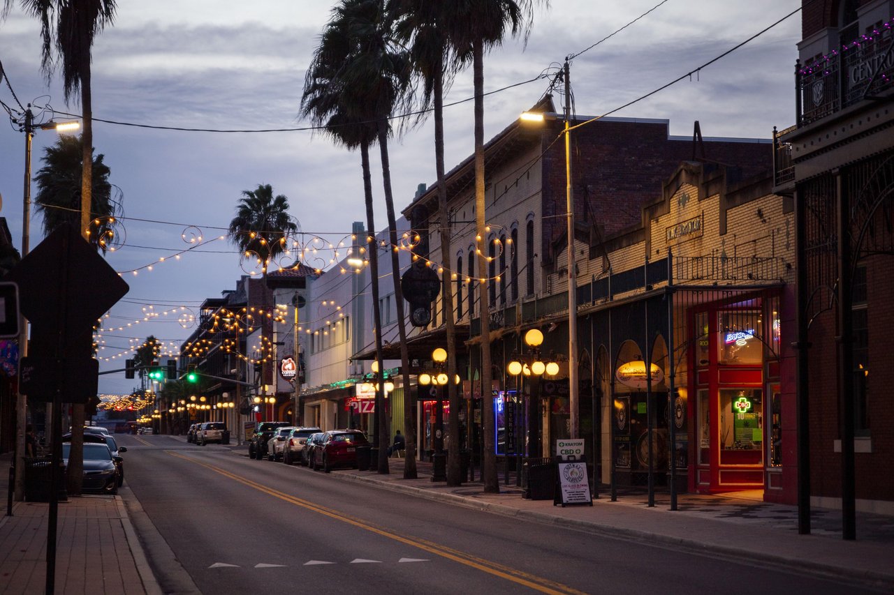 Brick streets and historic architecture in Ybor City at dusk