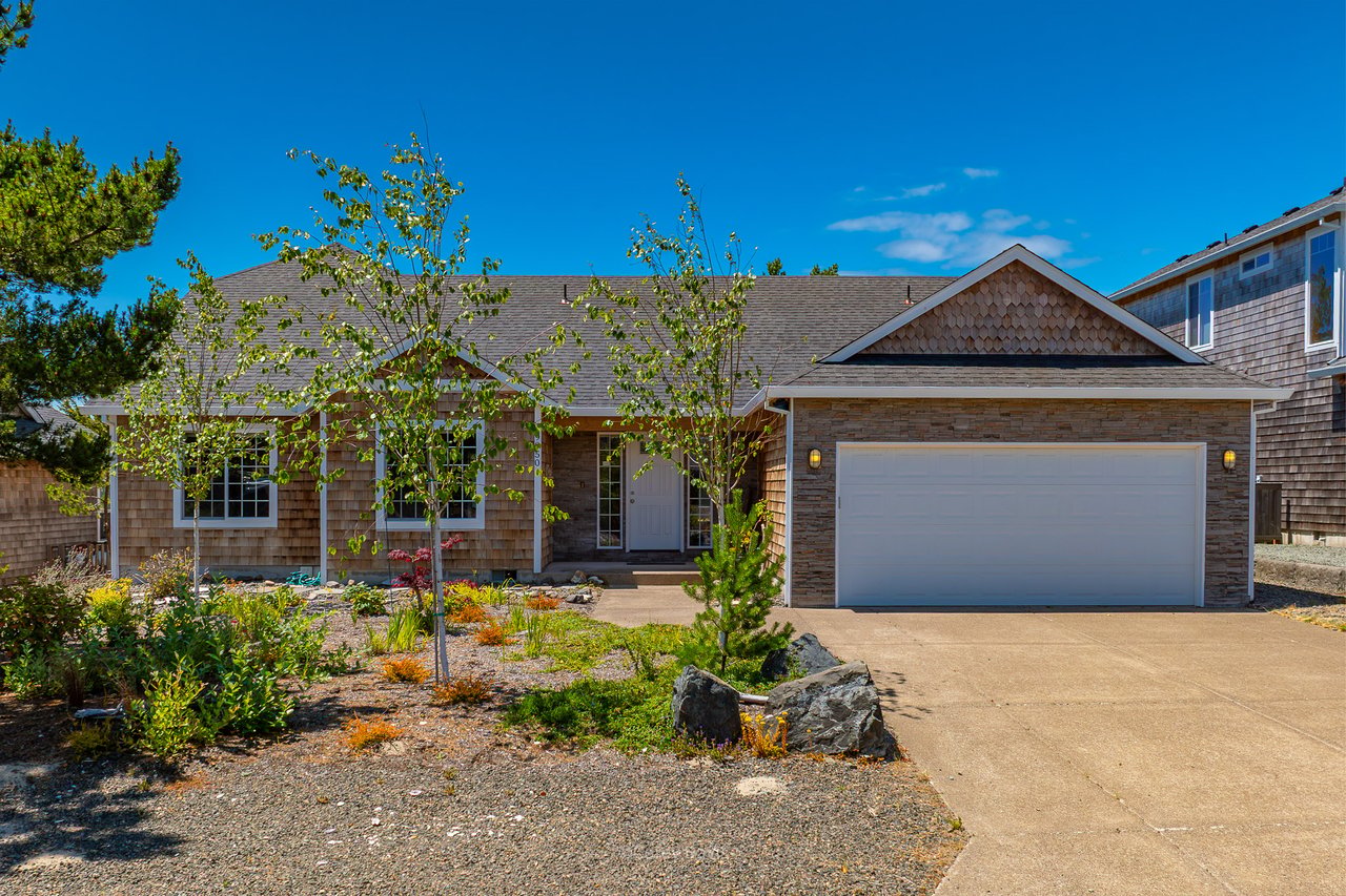 Sold Pine Ridge Summit home at 9950 Shore Pine Ln in Manzanita Oregon with ocean and mountain views