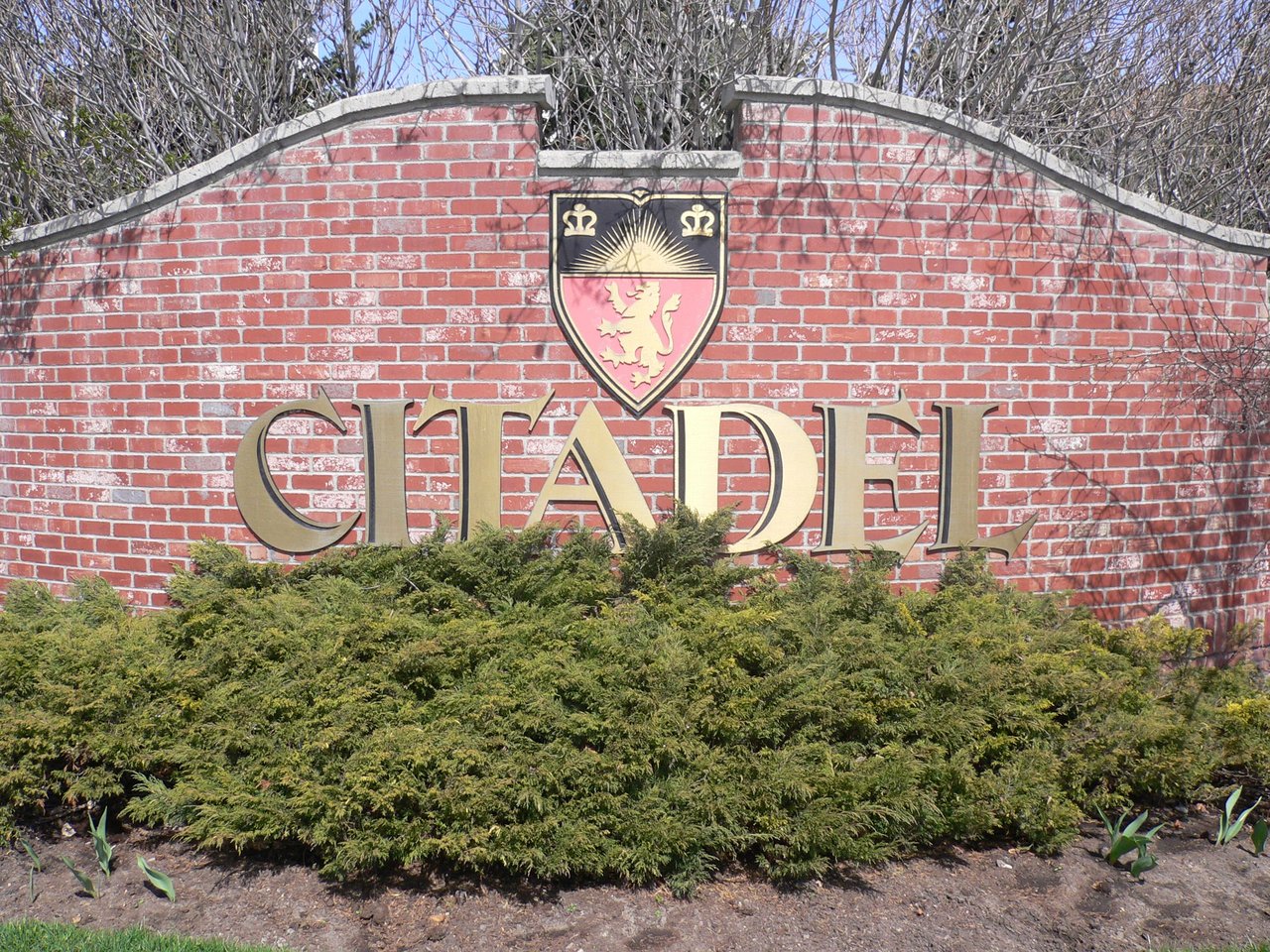 Citadel community entrance sign featuring the neighbourhood crest in northwest Calgary