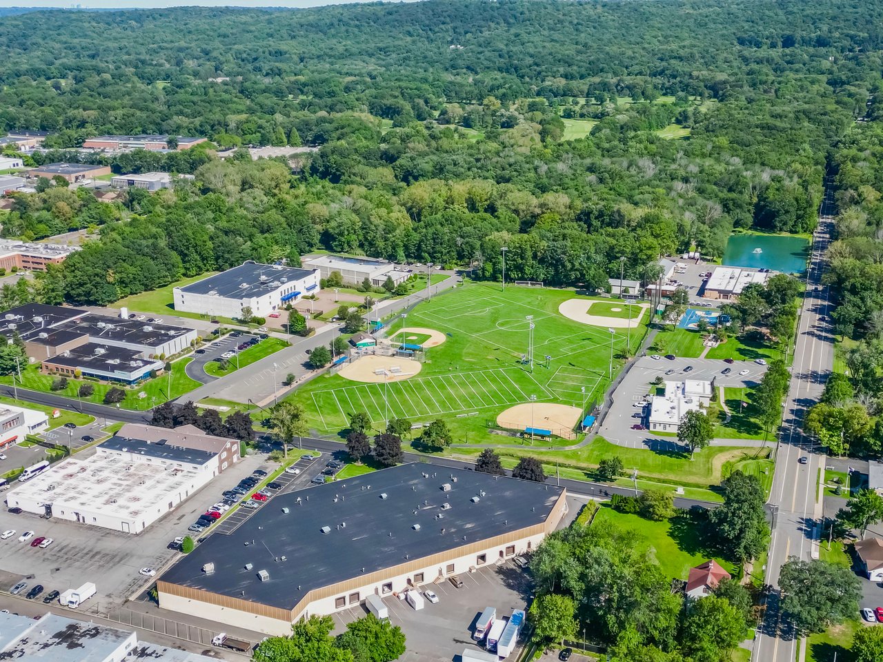 kennedy-field-norwood aerial view of sports fields and surrounding trees