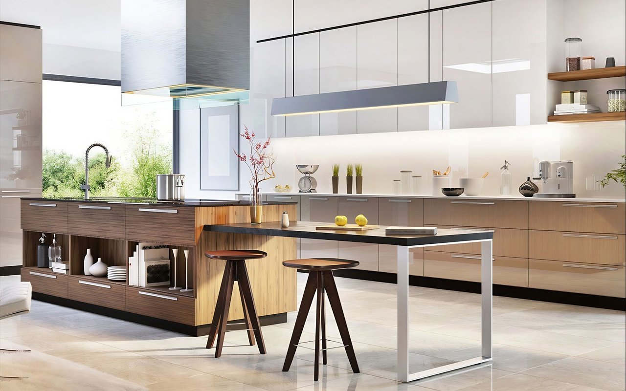 Modern kitchen with warm wood cabinetry, a large black-topped island, and two stools.