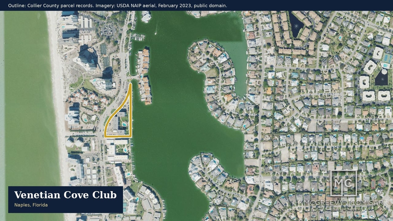 Aerial view of Venetian Cove Club, outlined beside the Gulf beach and waterways in Naples.