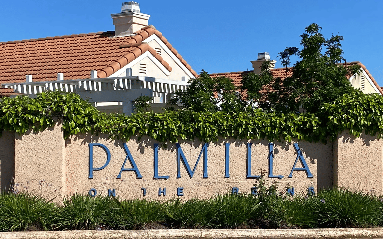 The entrance monument sign for the Palmtilla subdivision in Menifee, California.