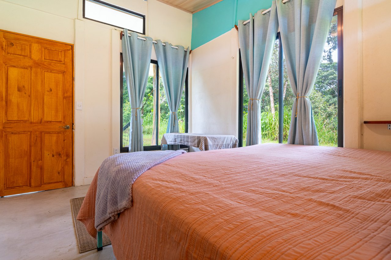 Plant Your Roots at Tierra Bendita! 2.5 Acres, River Frontage, 2 Bedroom Home, Private, Easy Access!