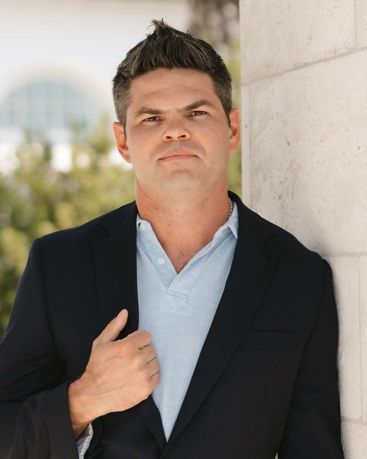 John Currence, real estate advisor with The Kendall Hood Collection, in professional headshot
