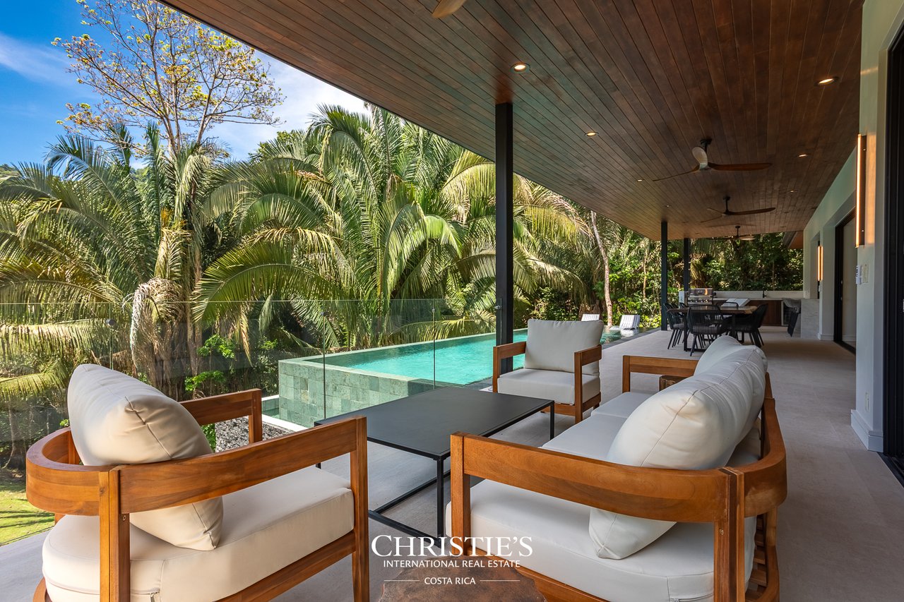 Modern Tropical Ocean & Mountain View Home