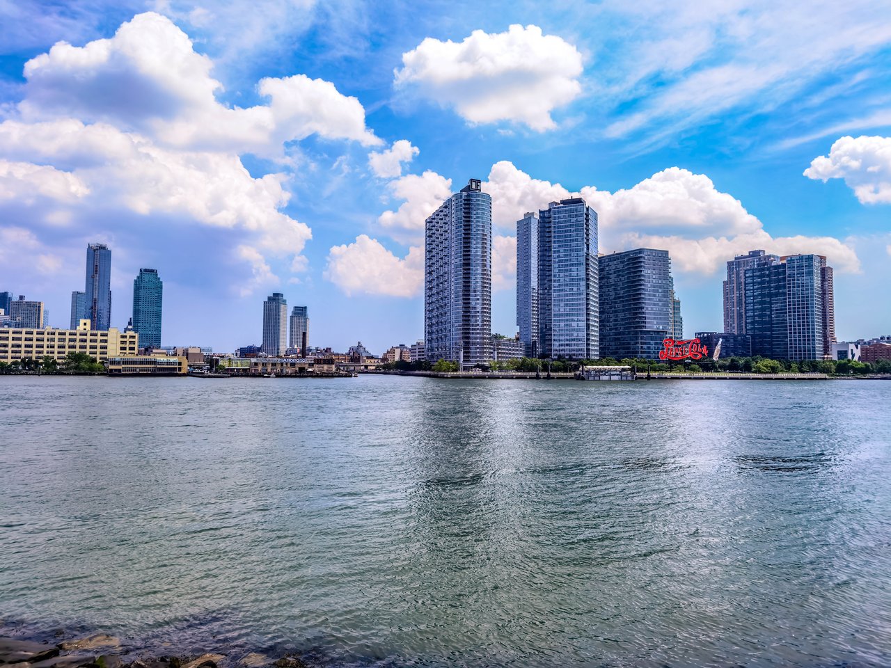 The Dutch Collection at 33-10 38th Avenue in Long Island City, Queens, featuring boutique luxury condominium residences, contemporary architecture, premium finishes, and modern amenities.