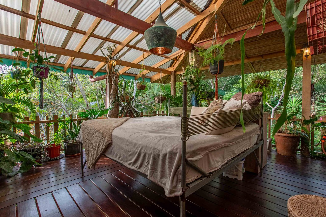 A Handcrafted Residence Immersed in Nature Above the Canopy Ocean View Architectural Home