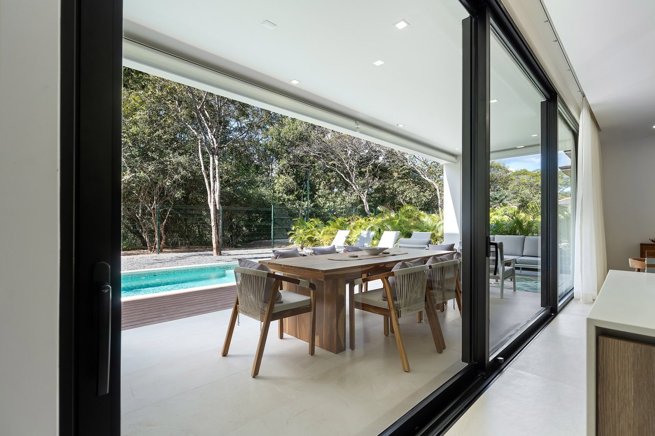 Villa Tropical Dawn | 4-Bedroom Modern Oasis in Bosques de Pinilla with Forest Views & Resort-Style Amenities