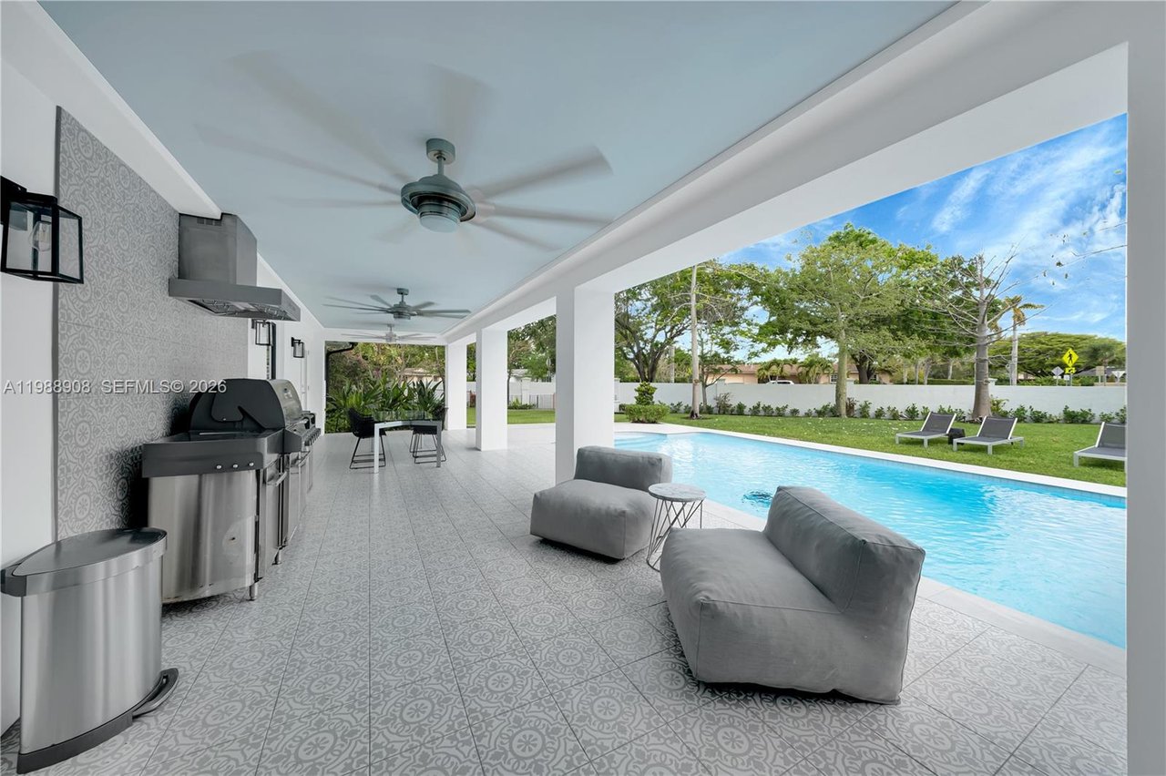 10705-sw-128-terrace-miami-home-for-sale-living-area-backyard