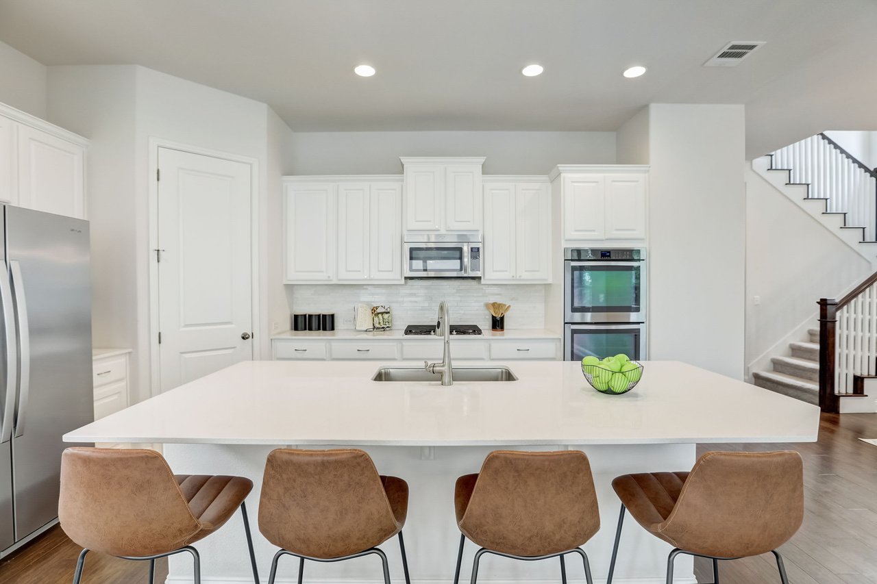Spacious 4-Bedroom Home in The Preserve at Four Points – A+ School District, Open Floorplan, Luxurious Primary Suite, Covered Patio, and More!