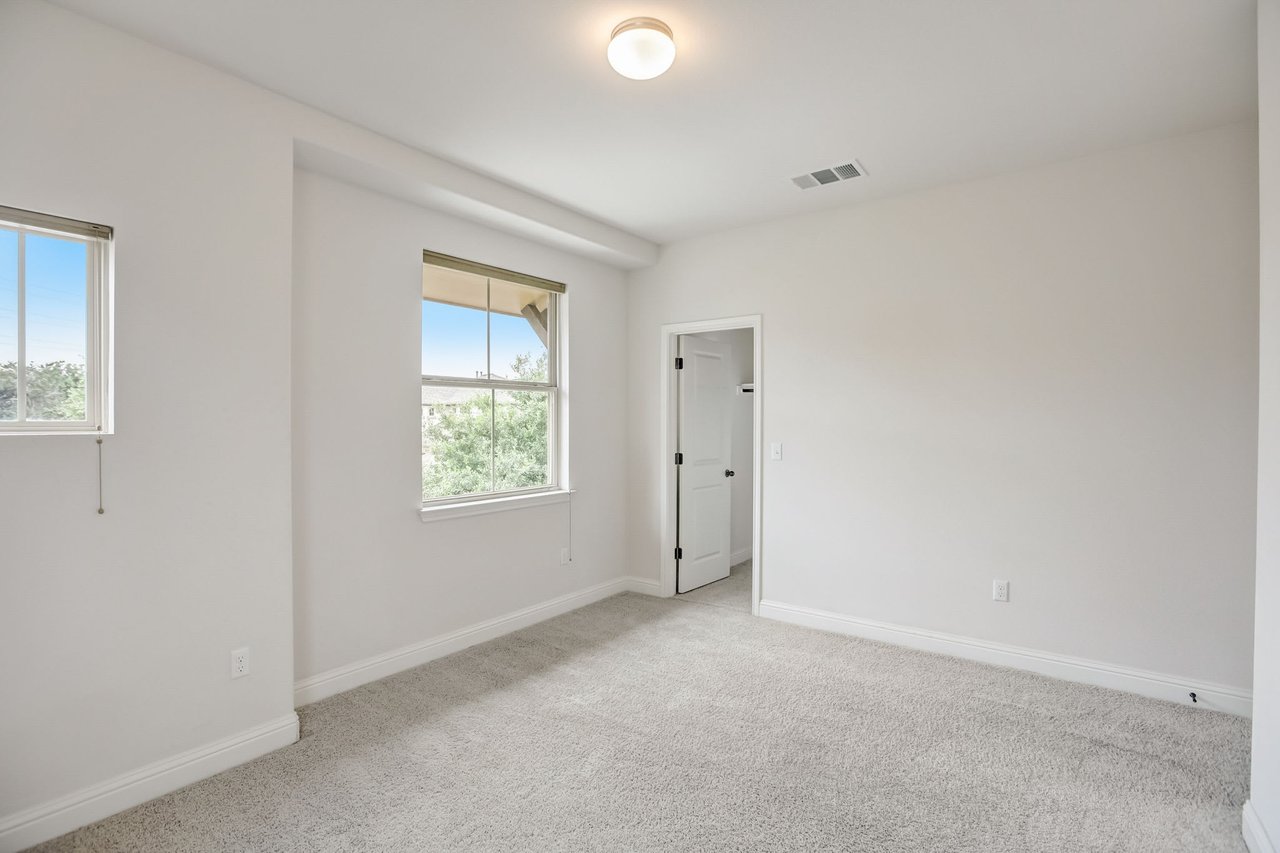 Spacious 4-Bedroom Home in The Preserve at Four Points – A+ School District, Open Floorplan, Luxurious Primary Suite, Covered Patio, and More!