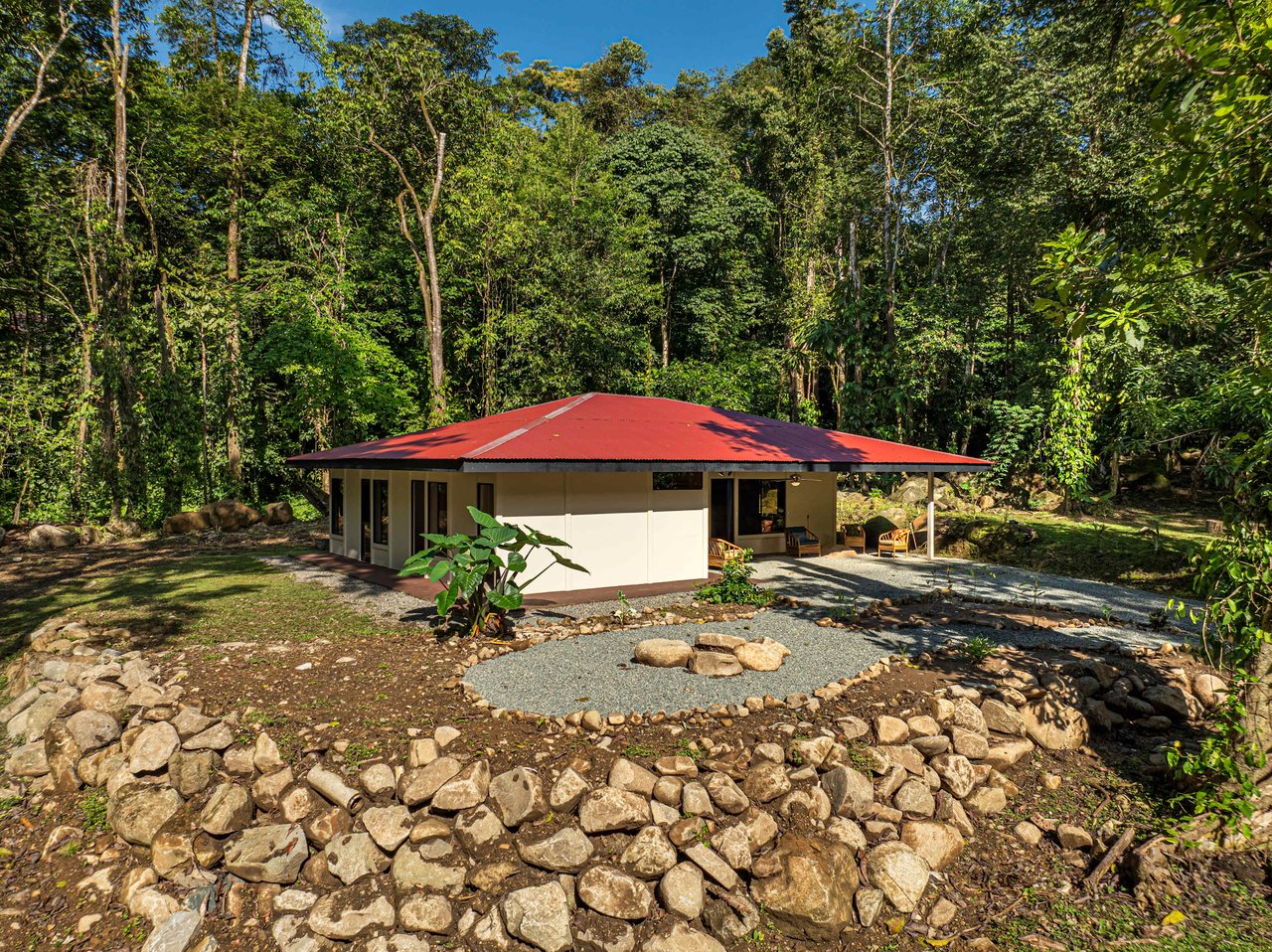 Versatile Riverfront Retreat: 5.3 Acre Rare Gem with Multiple Homes 