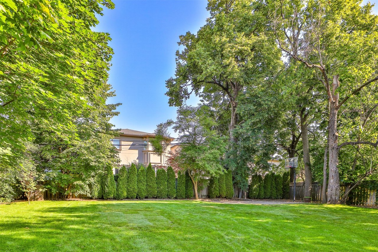 SOLD: Stunning and Sleek Design Built On Spectacular Lush Pie Shaped Lot