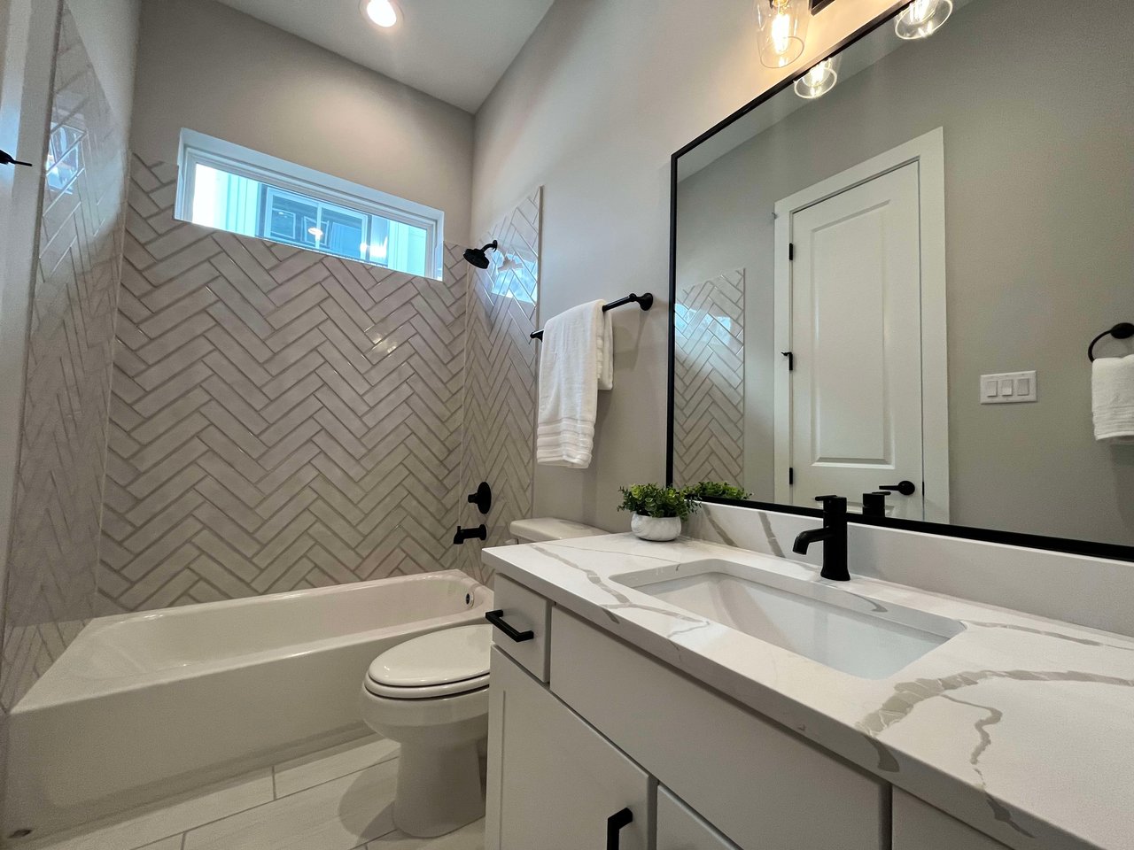 bathroom with a tiled shower 