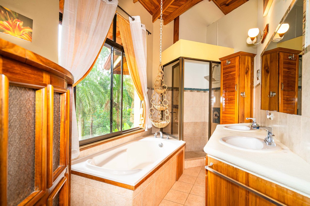 Stunning Tropical Home in Gated community with Hundreds of fruit trees  