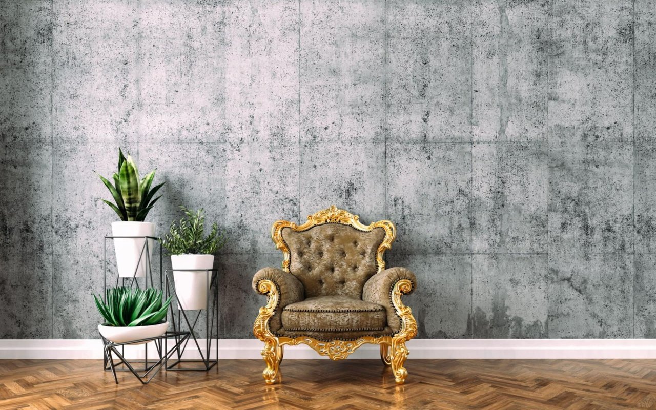  A lavish, antique-style armchair with ornate golden carved wood arms and legs