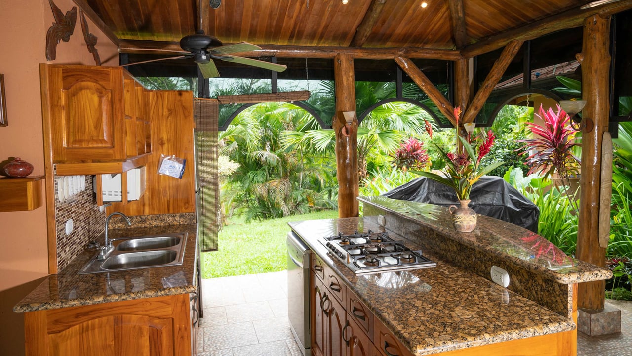 Stunning Tropical Home in Gated community with Hundreds of fruit trees  