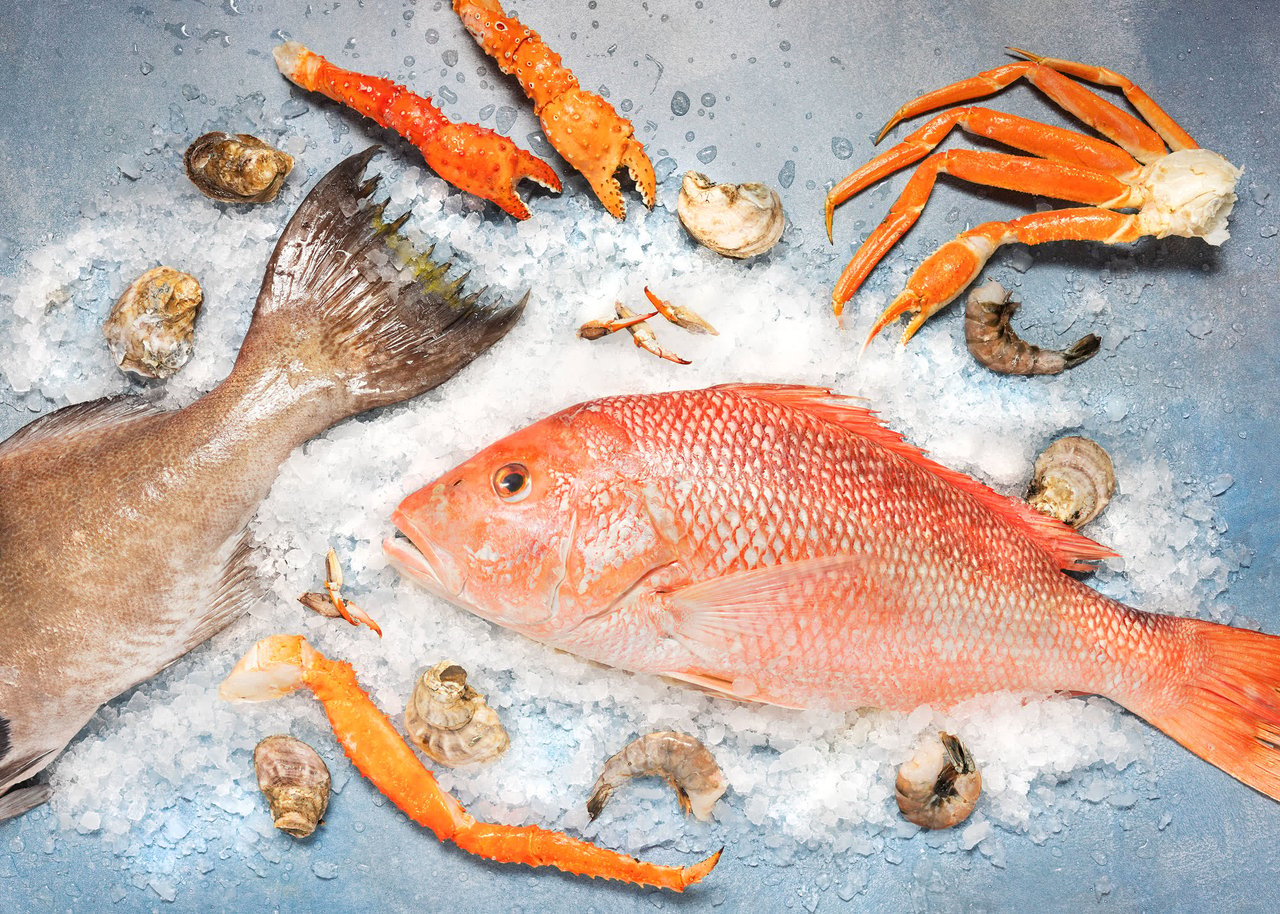 Fresh seafood, fish, crab claws, shrimp, and oysters at Goatfeathers Seafood Market in 30Avenue.