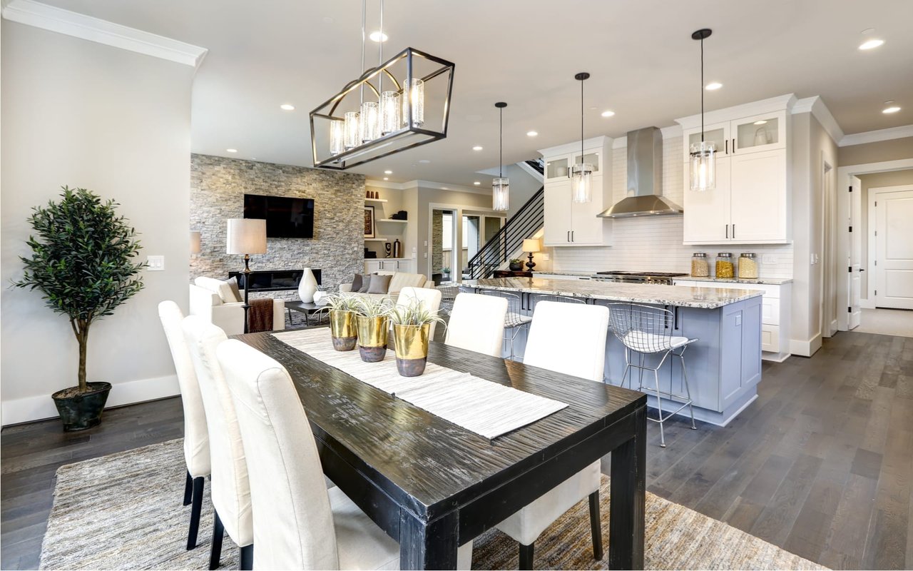 White-Colored Kitchen with Black Dining Table 