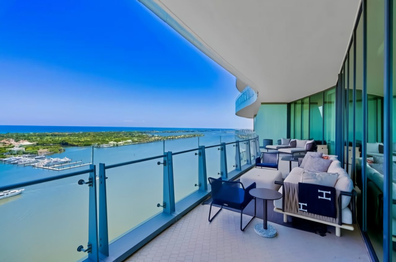 Luxury large terrace with furniture overlooking the intracoastal and Atlantic Ocean in Palm Beach