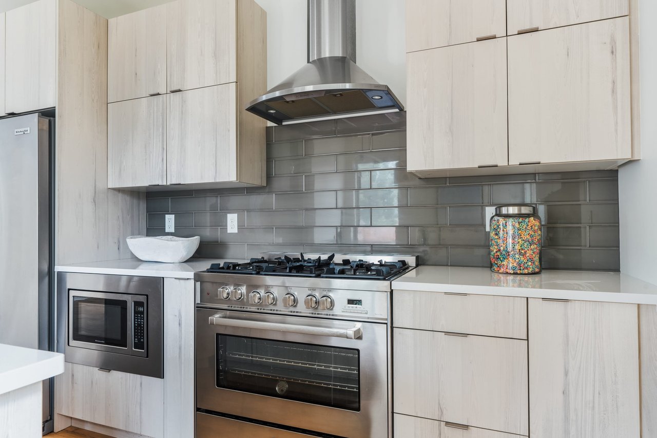 Check it out! Tastefully updated Five Points townhome