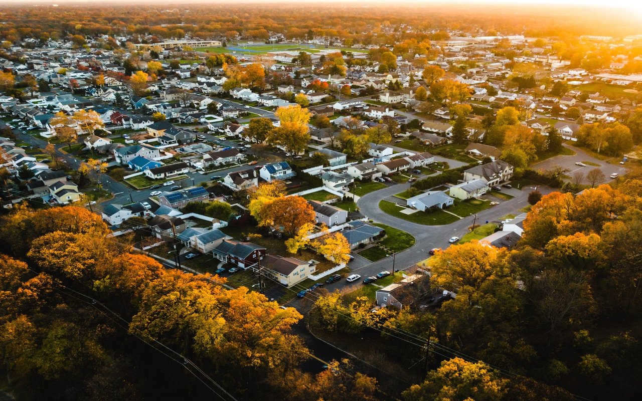 An aerial view of a residential neighborhood in the fall.