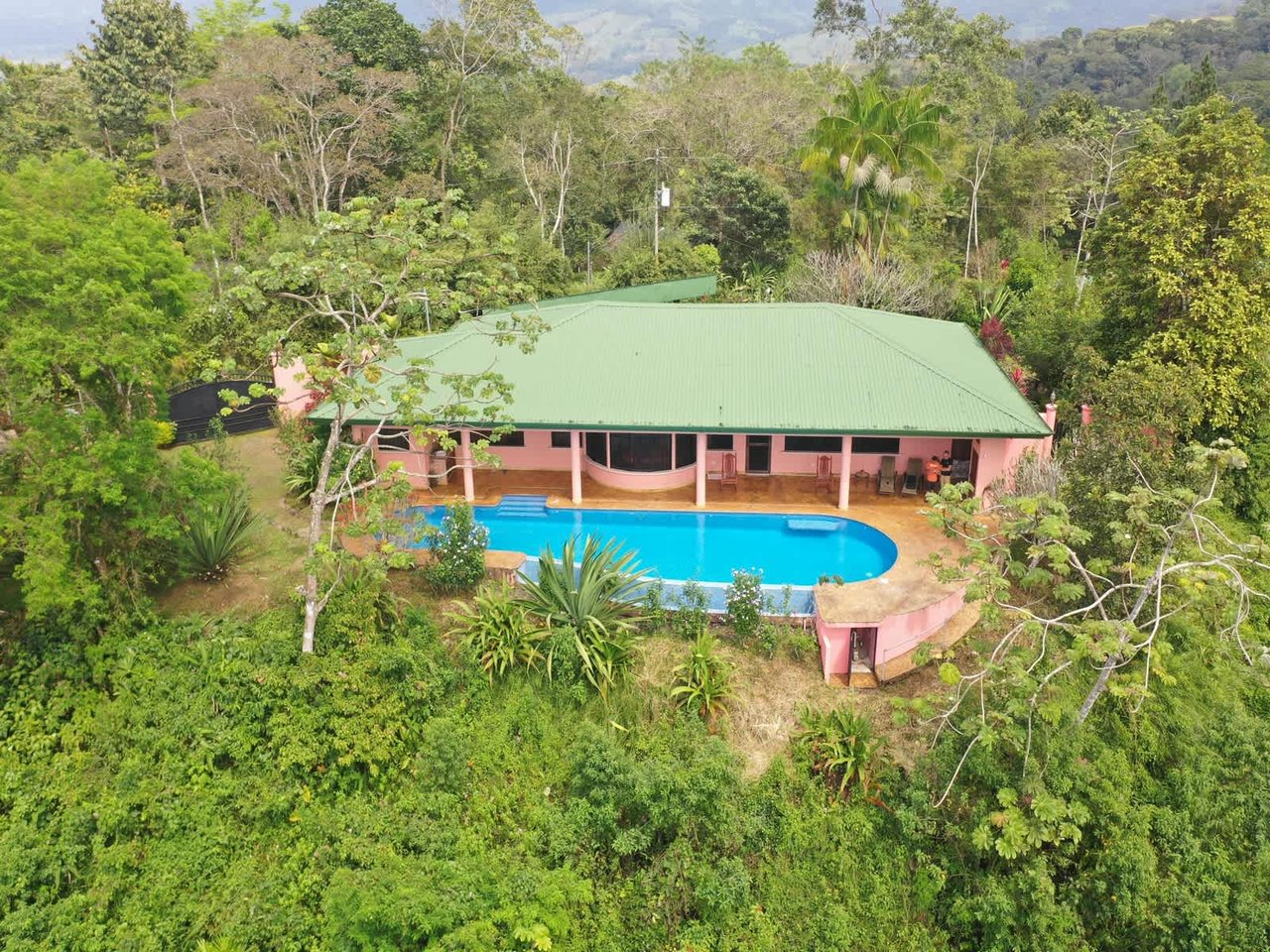 5.2 ACRES – 2 Bedroom Home With 60 Ft Infinity Lap Pool, 1 Bedroom Guest House, Fabulous Ocean View, Mature Fruit Trees!