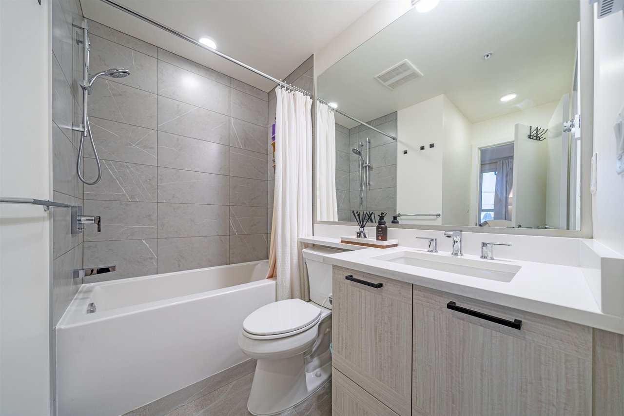 606-7169 14th Ave