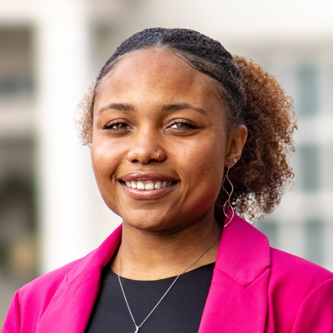 Anaiya Midget's professional headshot: smiling in business attire, confident and approachable, real estate expert in Nashville.