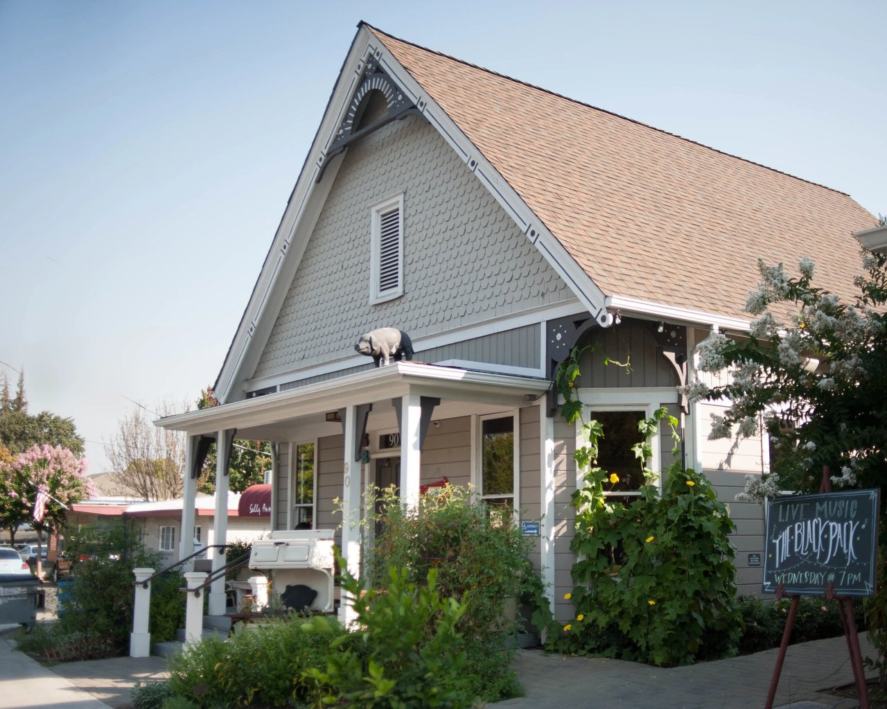 sideboard cafe in Danville, california, a cafe or lunch or brunch coffee spot, a small house looking building with white fencing and columns