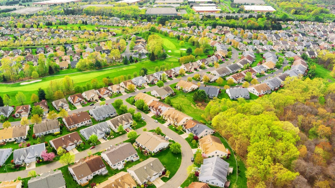 President Trump argues for keeping home prices high, borrowing costs low