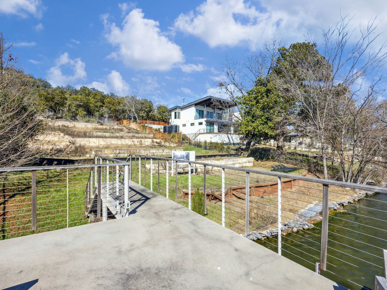 Shovel-Ready Lake Austin Lot with Permitted Plans + Double-Slip Dock