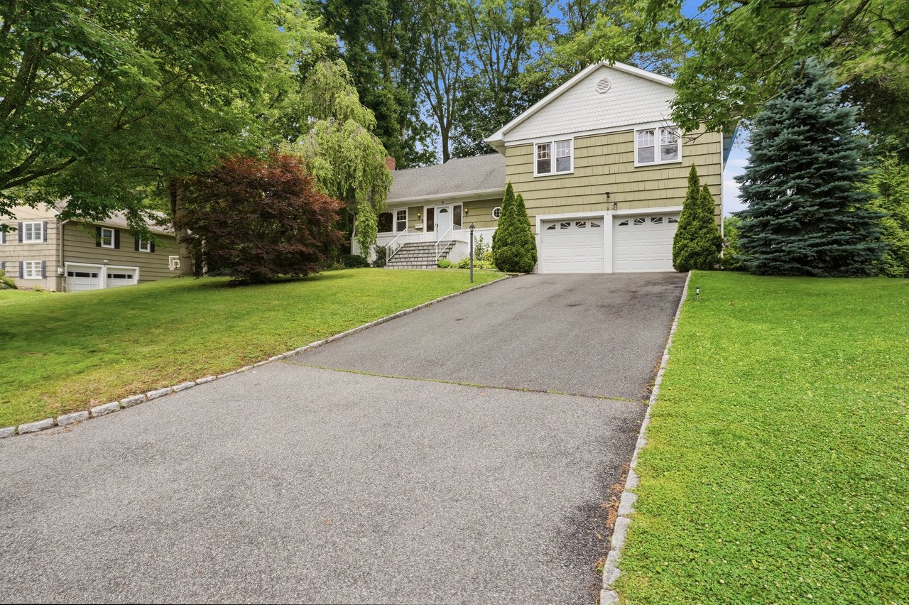 Private driveway leading to 2-car garage