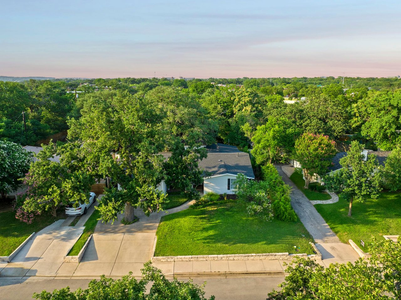 Twilight aerial skyline view from 2404 Westover Rd, Tarrytown, Austin.
