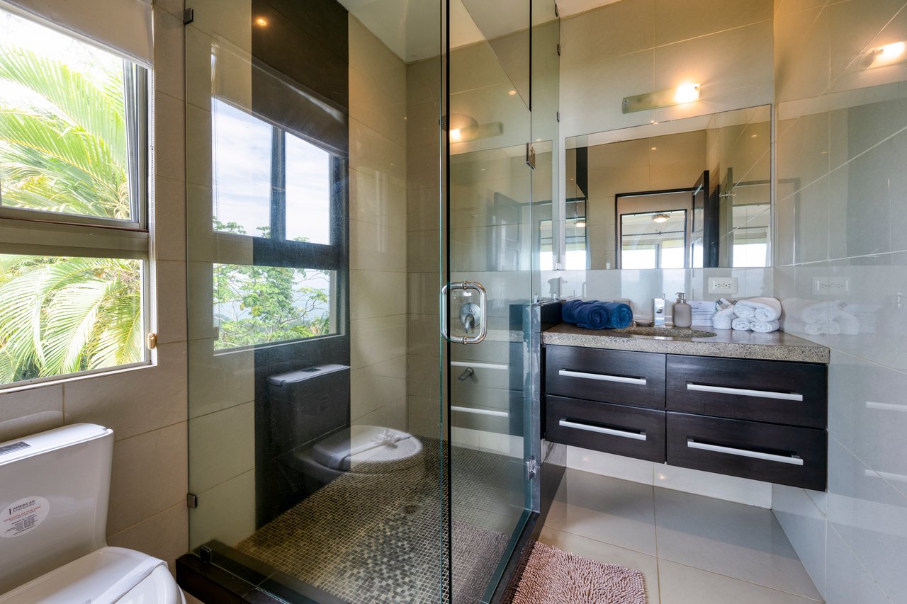 A Modern Jungle Haven with Panoramic Whales Tail Views